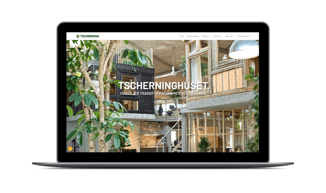 Tscherninghusets hjemmeside vist på en laptop-computer
